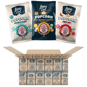 Three bags of LesserEvil Snacks Big Flavor Popcorn Box sit above an open box filled with multiple smaller popcorn bags neatly arranged in rows.