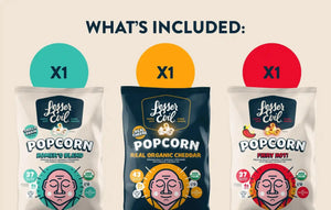 The Big Flavor Popcorn Box by LesserEvil Snacks includes three bags—Homer’s Blend, Real Organic Cheddar, and Fiery Hot Popcorn—one of each flavor shown under What’s included.