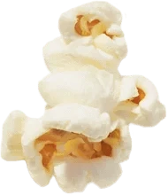 A close-up of three pieces of popped popcorn stacked together, showing their fluffy white texture and golden centers.
