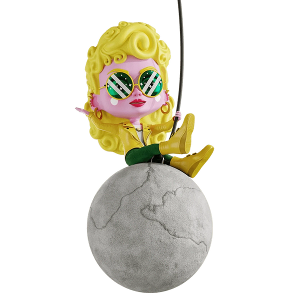 A stylized, doll-like figure with yellow curly hair, large sunglasses, and yellow boots sits on a gray sphere, holding a rod. The figure has a pink face and wears a yellow outfit.