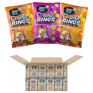 Three vibrant Dotties Delights Cosmic Rings bags by LesserEvil Snacks sit above an open box, promising a delicious and fun snack time.
