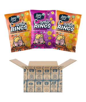 Three vibrant Dotties Delights Cosmic Rings bags by LesserEvil Snacks sit above an open box, promising a delicious and fun snack time.