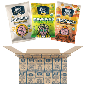 Three vibrant LesserEvil Snacks—Himalayan Gold Popcorn, Real Organic Cheddar, and Intergalactic Onion Moonions—sit atop an open Snacktime Box filled with delicious treats.