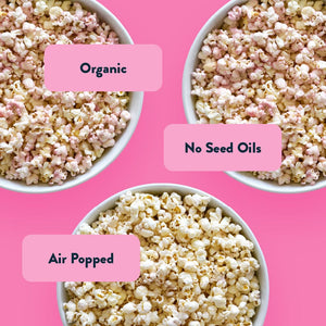 The Sweet Summer Box by LesserEvil Snacks features air-popped popcorn in juicy flavors like Pink Lemonade and Watermelon Hibiscus—organic and made with no seed oils.