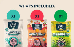 Three bags of LesserEvil Snacks—Homer’s Blend Popcorn, Outer Planet Pizza Space Balls, and Intergalactic Onion Moonions—are in the Flavor-FULL Snacks Box under “What’s Included: x1” each.