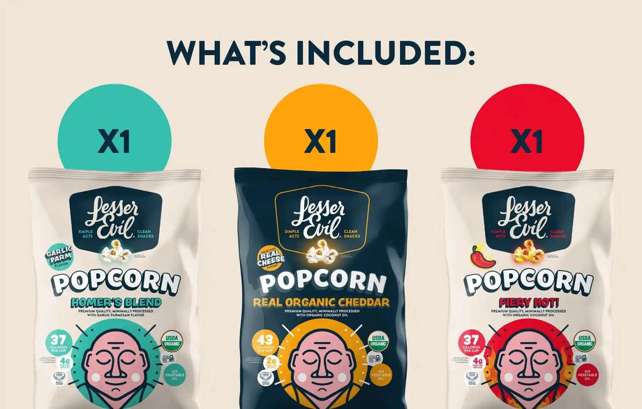 The Big Flavor Popcorn Box by LesserEvil Snacks includes three bags—Homer’s Blend, Real Organic Cheddar, and Fiery Hot Popcorn—one of each flavor shown under What’s included.