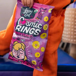 A person in an orange astronaut suit holds a Lil Favorites Kids Snacks Box by LesserEvil Snacks with colorful, playful packaging.