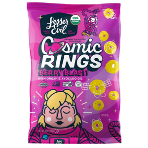 A pink bag of LesserEvil Berry Blast Cosmic Rings organic corn snacks, made with avocado oil and fruit powders, features space-themed art and a blond-haired character on the front.