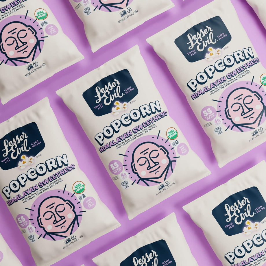 Himalayan Sweetness Gourmet Popcorn by OrganicPopcorn is arranged diagonally on a pastel purple background.