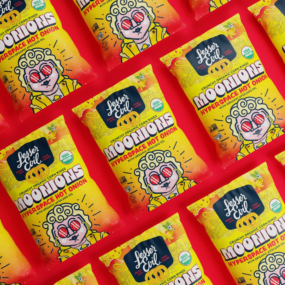 Bags of LesserEvil Hyperspace Hot Onion Moonions with a cartoon onion are arranged in a grid on a bright red background.