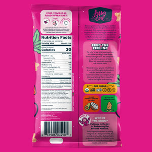 Back of a bright pink LesserEvil Star-Berry Beet Lil Puffs pack with nutrition facts, 0g added sugar, toddler tips, berry treat art, QR code, and barcode at the bottom.