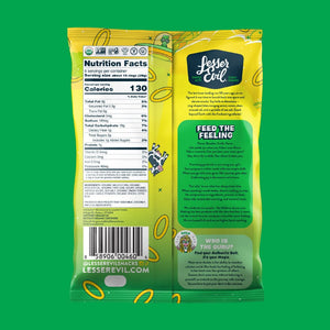 Back of a yellow-green LesserEvil Intergalactic Onion Moonions bag with nutrition facts, product story, and barcode on a solid green background.