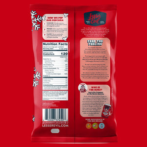 The back of a LesserEvil Sweet + Salty Popcorn bag on a red background shows details on organic cane sugar, nutrition facts, ingredients, brand info, and fun illustrations.
