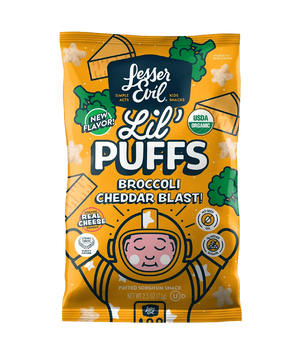 A yellow bag of LesserEvil Broccoli Cheddar Blast Lil Puffs features cartoon cheese, broccoli, and an astronaut, labeled USDA Organic and made with real cheddar cheese.