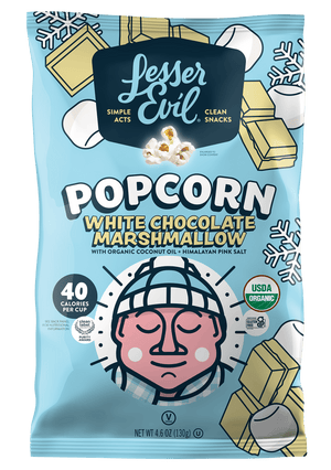 LesserEvil White Chocolate Marshmallow popcorn in blue holiday packaging with snowflakes, popcorn pieces, and a pink face in a winter hat.
