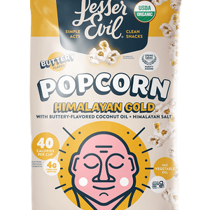 A bag of LesserEvil Himalayan Gold Organic Butter Flavor Popcorn features a meditating figure, popcorn images, and plant-based butter nutrition on a white and gold design.