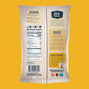 Back of a Himalayan Gold Organic Butter Flavor Popcorn bag by LesserEvil on yellow, showing nutrition facts, organic coconut oil as butter alternative, brand story, barcode, and icons.