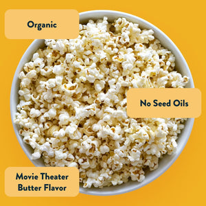 A bowl of LesserEvil Himalayan Gold Organic Butter Flavor Popcorn on a yellow background, labeled “Organic,” “No Seed Oils,” and “Movie Theater Butter Flavor.”.