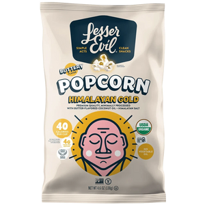 A bag of LesserEvil Himalayan Gold Organic Butter Flavor Popcorn, made with coconut oil and plant-based butter, features a stylized face and highlights organic, 40 calories per cup, and buttery salt flavor.