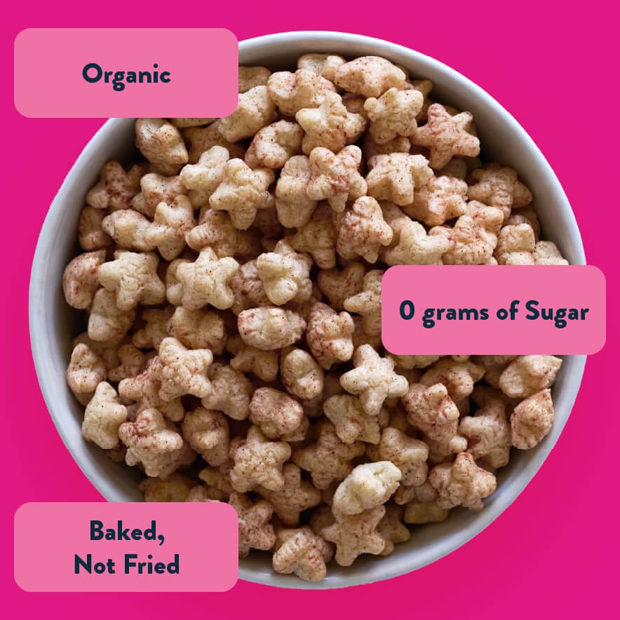 A bowl of Star-Berry Beet Lil Puffs by LesserEvil—bear-shaped, organic, 0g added sugar, baked not fried, Clean Label Certified—on a pink background.