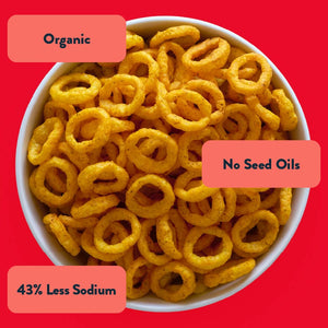 A bowl of LesserEvil Hyperspace Hot Onion Moonions, yellow rings made with avocado oil; Organic, No Seed Oils, 43% Less Sodium.