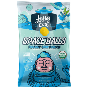 Rocket Ship Ranch Space Balls by SpaceBalls features a cartoon astronaut and space-themed art on a bold blue bag for a cosmic snacking experience.
